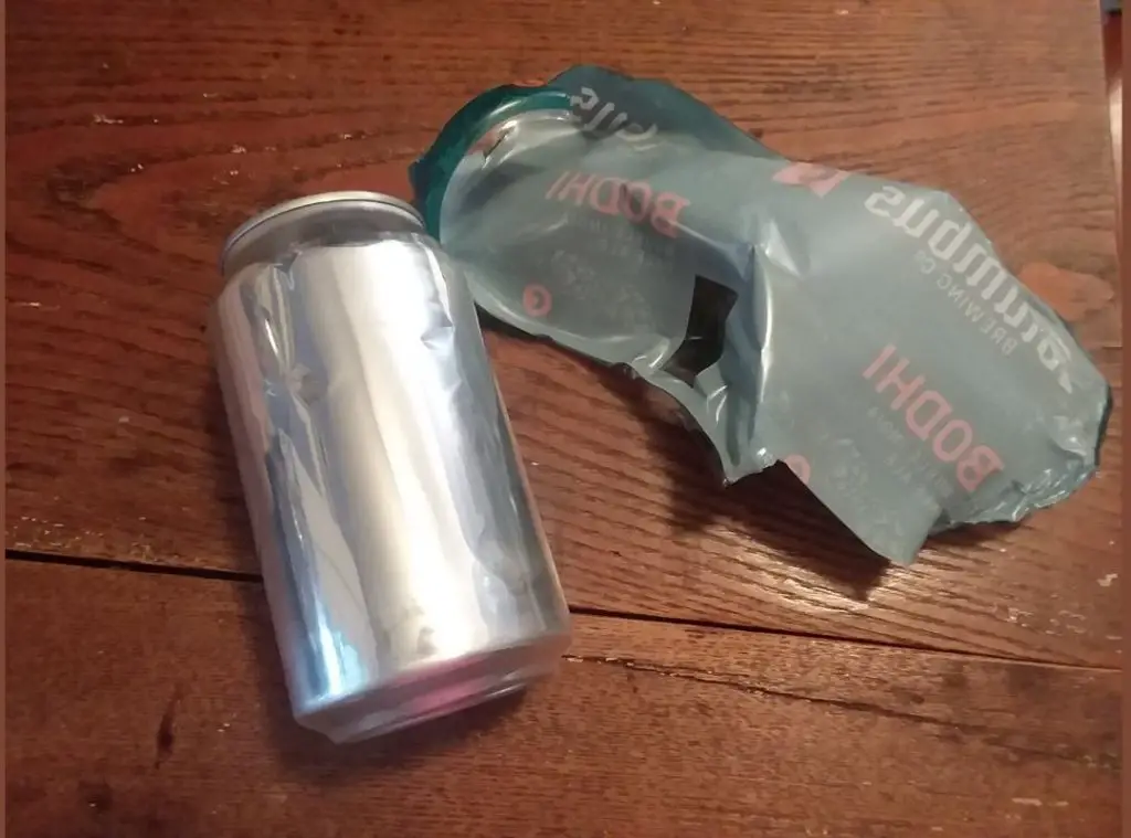 Aluminum can with shrink-wrap label removed.