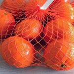 Bag of oranges in plastic mesh bag