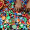 How do I recycle plastic bottle caps?